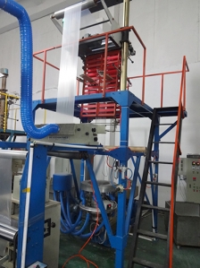 Plastic film blowing machine